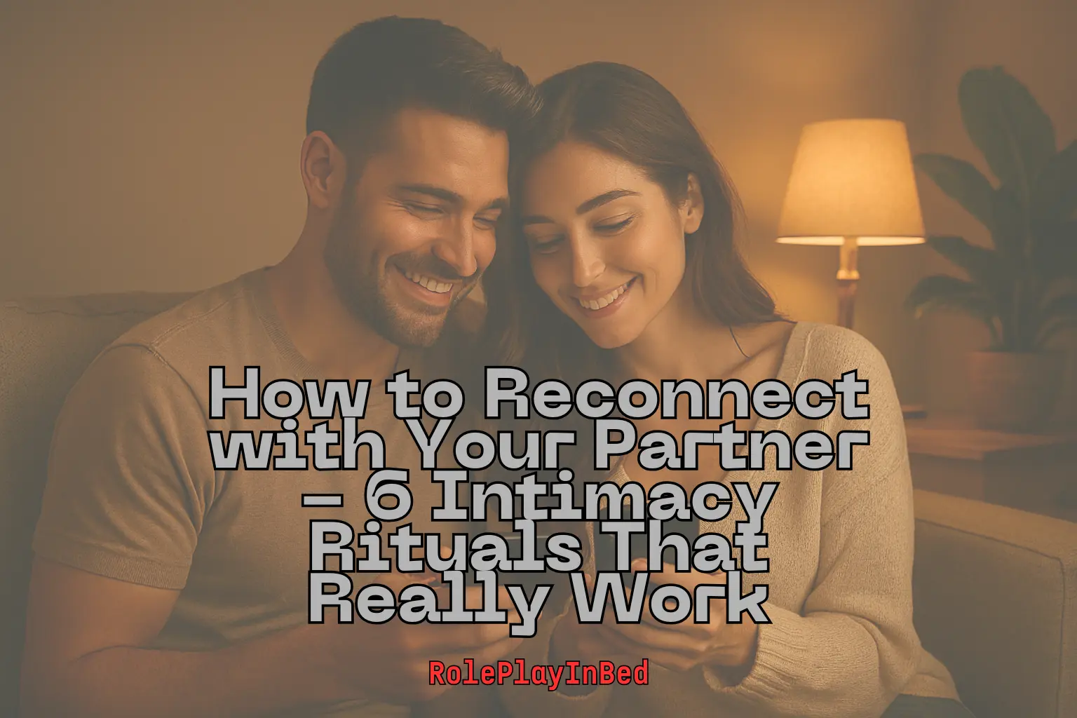 Happy couple smiling together on the couch, sharing a warm moment – how to reconnect with your partner through intimacy rituals.